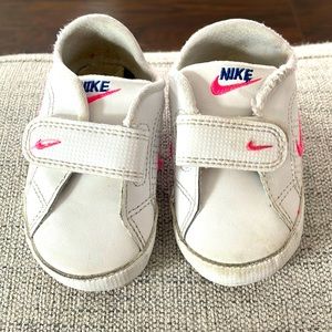 Pink and white baby Nike slippers